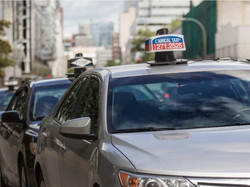 MONTREAL, QUE.: AUGUST 14, 2014 -- The City of Montreal has unveiled its first ever policy for the taxi industry, on Thursday, August 14, 2014. (Dave Sidaway / THE GAZETTE) ORG XMIT: 50704